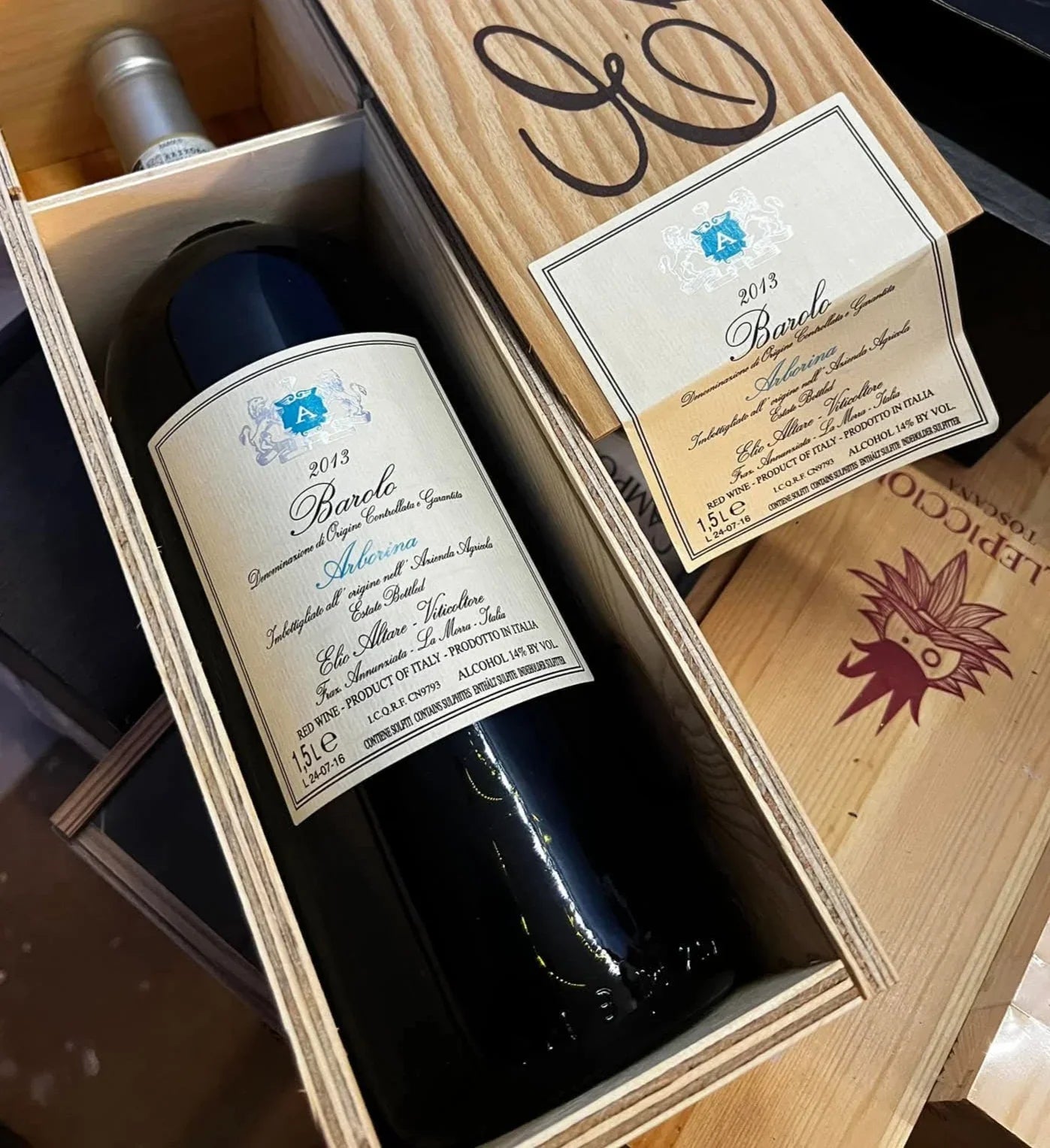 Barolo 2013 wine bottle in wooden box with detailed label, premium Italian red wine